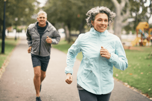 couple jogging on path